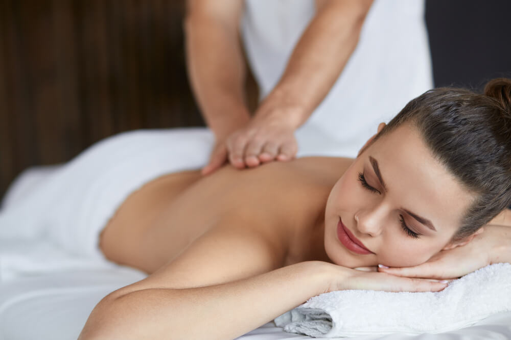 A relaxed patron enjoying a San Juan Islands Spa experience.